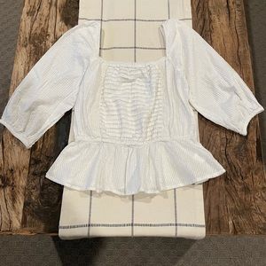 Boutique white dressy shirt.